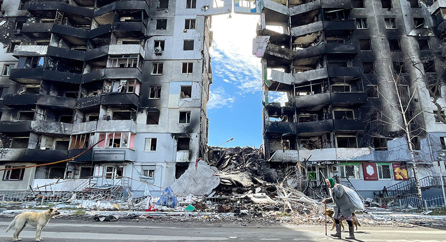 An elderly with a walking stick walk past a devastated residential apartment by Russian airstrikes in Borodyanka, Bucha Raion of Kyiv Oblast, as the Ukrainian military had retaken the area, amid the Russian invasion, in Borodyanka, Bucha Raion of Kyiv Oblast, Ukraine, 7 April 2022