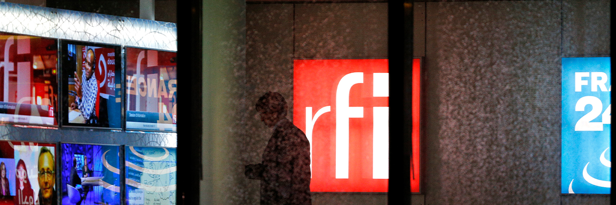 A man walks inside the RFI (Radio France International)  France 24 headquarters in Issy-Les-Moulineaux, near Paris, France.