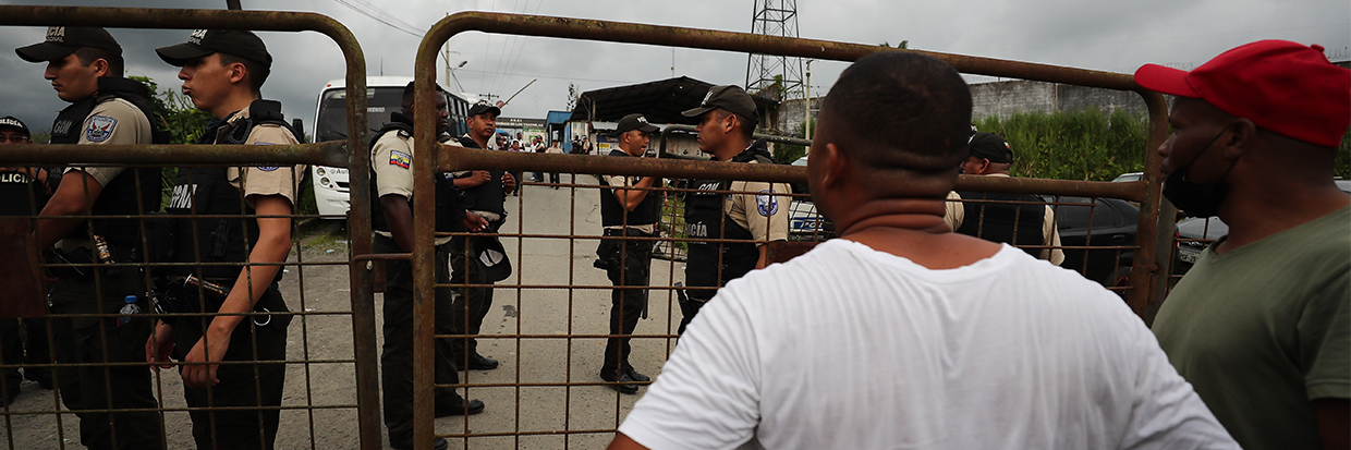 Members of the police guard the exterior of the Santo Domingo de los Tsachilas prison after a riot, in Santo Domingo, Ecuador, 09 May 2022