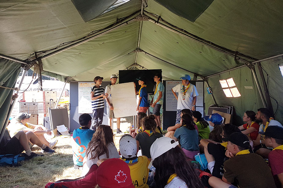 Scout participants join Elena Ippoliti, Coordinator of the UN Human Rights Education and Training Unit (shown far right), who co-designed and conducted UN Human Rights workshops in Italian. Photo Credit: OHCHR