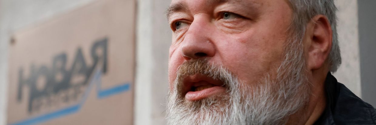 Russian investigative newspaper Novaya Gazeta's editor-in-chief Dmitry Muratov, one of 2021 Nobel Peace Prize winners, speaks with journalists in Moscow, Russia October 8, 2021  © Reuters