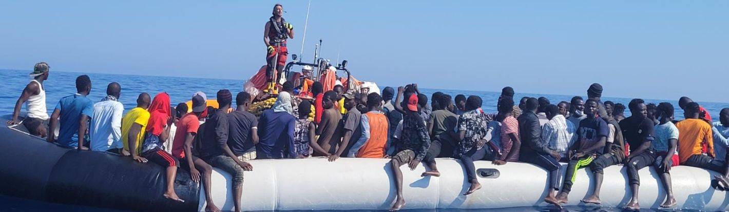 Ocean Viking, a cargo vessel conducting search and rescue activities in the central Mediterranean, rescues an overcrowded rubber boat in distress in international waters off Libya on Sunday July 24, 2022. © Reuters