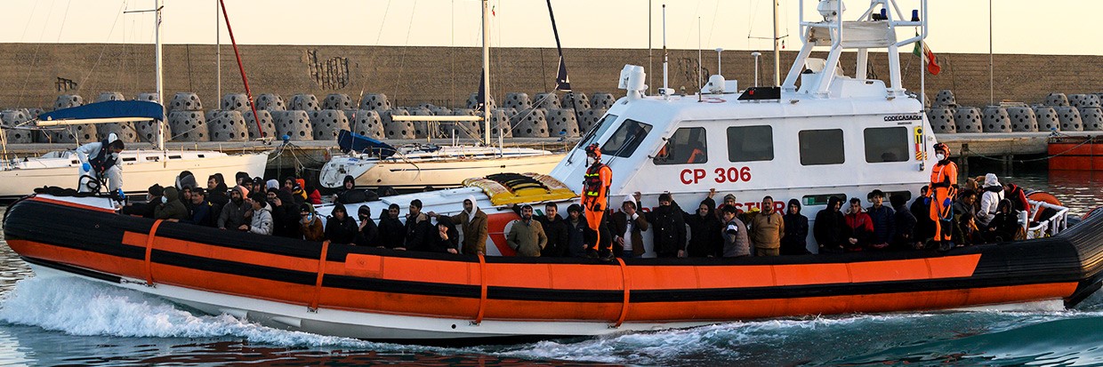 A patrol boat with migrants seen arriving at the port. Nearly 90 migrants, mainly from Afghanistan, Pakistan, and Iran, had been rescued by the Italian Coast Guard and taken at the port of Roccella Jonica “Porto Delle Grazie”. A baby, born three days ago during the crossing, a newborn of 11 days, and a baby of five months were also on board. Members of the Red Cross and Doctors Without Borders and sanitary personnel assisted the babies, their families, and other migrants SOPA Images/Sipa USAValeria Ferraro 