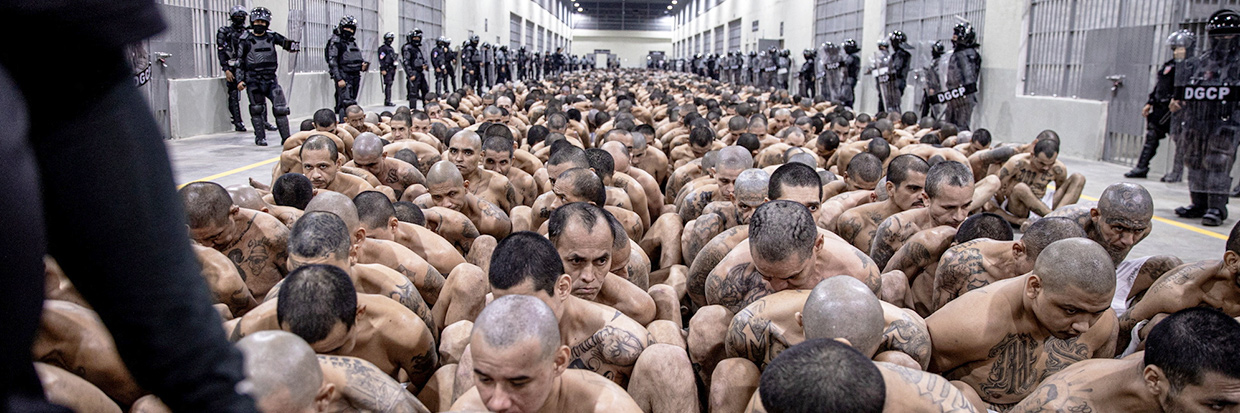 Gang members wait to be taken to their cell after 2000 gang members were transferred to the Terrorism Confinement Center, according to El Salvador's President Nayib Bukele, in Tecoluca, El Salvador, in this handout distributed to Reuters on March 15, 2023. © Secretaria de Prensa de la Presidencia/Handout via REUTERS