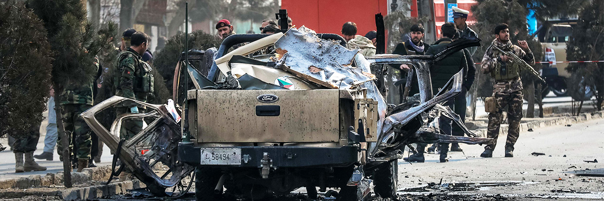 Afghan security forces inspect the site of a bomb explosion in Kabul, Afghanistan, 01 February 2021. At least one civilian and a security force member were killed and one other injured after a magnetic improvised explosive device (IED) explosion targeted an army vehicle in Kabul. EPA-EFE/HEDAYATULLAH AMID