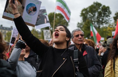 A protester at a march in support of the Woman, Life, Freedom movement in Iran, Paris, France, 2 October 2022.  © Maylis Rolland / Hans Lucas via Reuters Connect