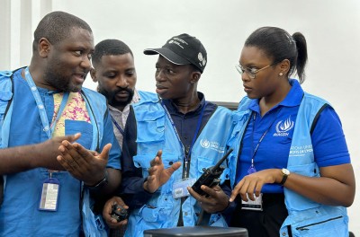 Four UN Human Rights officers are briefed before their deployment to monitor the elections in the DR Congo, 20 December 2023. © UNJHRO