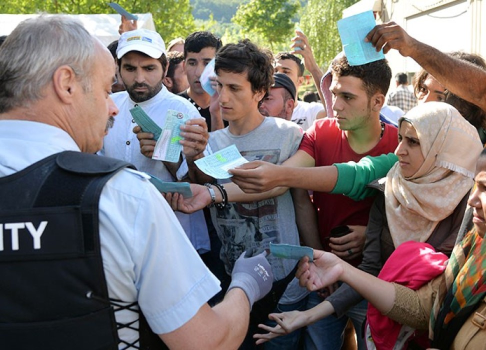 Crowd of people with security guard