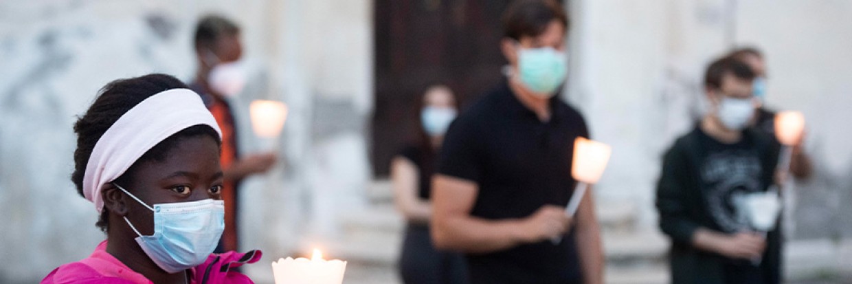 A candlelit protest against racism in Rome. Photo credit EPA-EFE/CLAUDIO PERI