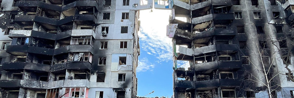 An elderly with a walking stick walk past a devastated residential apartment by Russian airstrikes in Borodyanka, Bucha Raion of Kyiv Oblast, as the Ukrainian military had retaken the area, amid the Russian invasion, in Borodyanka, Bucha Raion of Kyiv Oblast, Ukraine, 7 April 2022