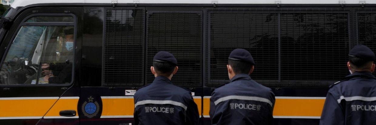 A prison van arrives at West Kowloon Magistrates' Courts building, as the hearing for the 47 pro-democracy activists, charged with conspiracy to commit subversion under the national security law, continues, in Hong Kong, China February 4, 2022. © Reuters