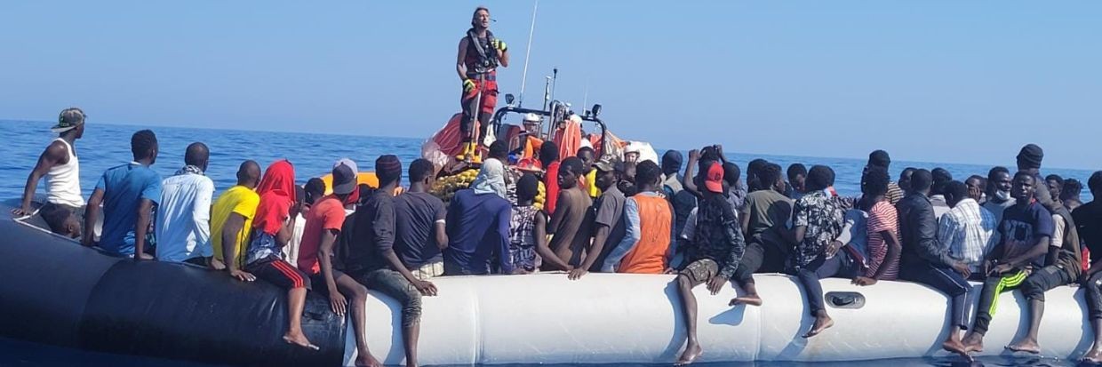 Ocean Viking, a cargo vessel conducting search and rescue activities in the central Mediterranean, rescues an overcrowded rubber boat in distress in international waters off Libya on Sunday July 24, 2022. © Reuters