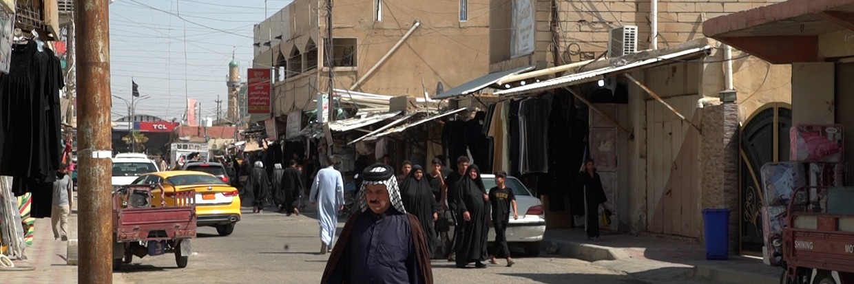 Rue commerçante à Chibayish, dans le gouvernorat de Dhi Qar, en Iraq, le 3 août 2023. Ⓒ HCDH