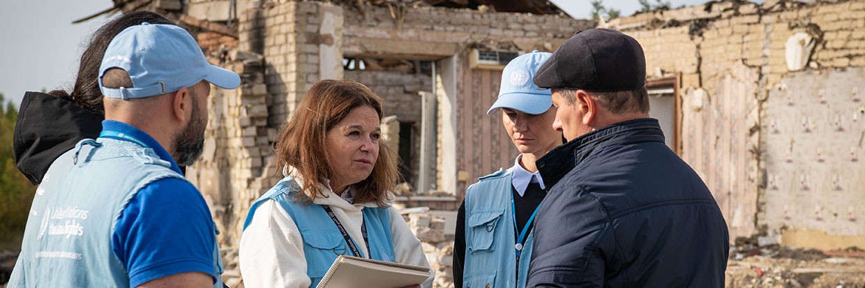 HRMMU team at the site of the tragedy in the village of Groza, where a missile strike killed at least 52 civilians. 7.10.2023 ©OHCHR