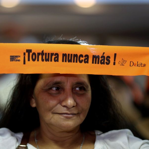 A person participates in the commemoration of the 'International Day of Prevention against Torture' in Tegucigalpa, Honduras, 26 June 2019. © EPA-EFE/Gustavo Amador