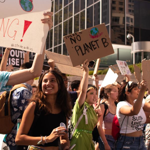 People at a protest. Photo by Ygor Lobo on Unsplash.