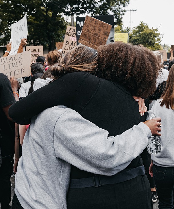 Two women hugging