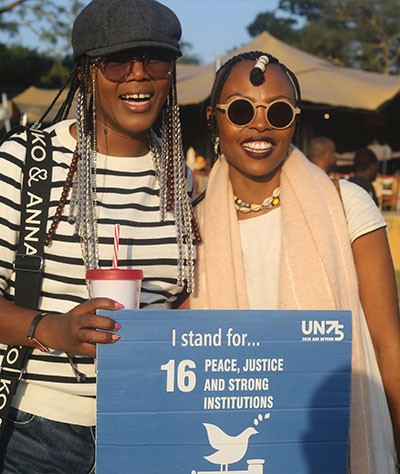 Festival participants had the chance to show their support for their favourite SDG by: (photo1) rotating on the 360-degree selfie stand, (photos 2 and 3) or holding a card showing their support.  ©Reign Pot