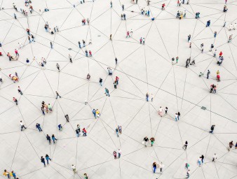 Aerial view of crowd connected by lines © Orbon Aliyah, Getty Images