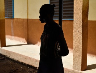 A young woman, who escaped a forced marriage, is seen at the Catholic nuns' shelter, Sainte Maria Goretti, where she now lives in Kaya, Burkina Faso, February 23, 2022.  © REUTERS/Anne Mimault