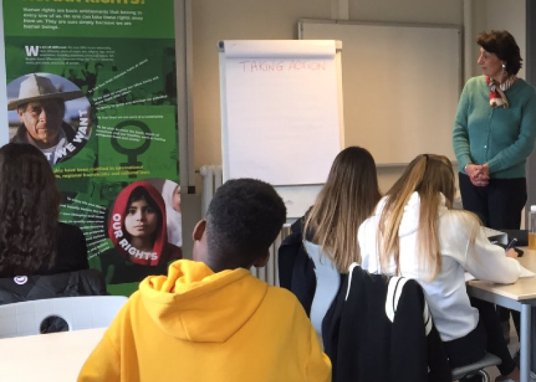 A teacher and students in a classroom