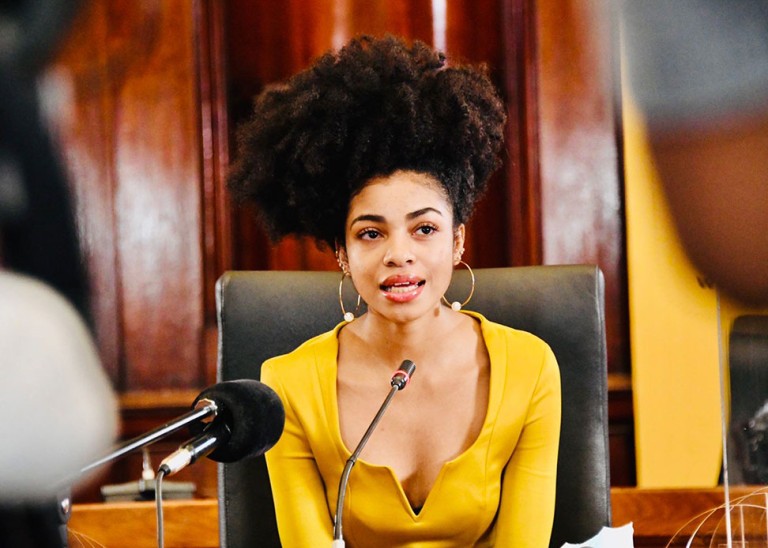 Still of Zulaikha Patel speaking about social justice before the former Deputy Minister of the Presidency at the South African Union Building in Pretoria. © IG @zulaikhapatel